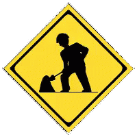 Yellow street sign of man digging